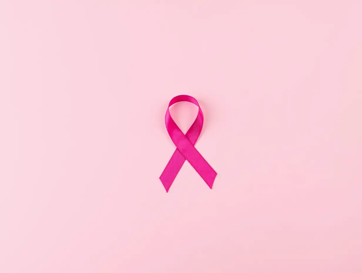 Breast-Cancer-Awareness-Pink-Ribbon-Symbol-on-Pink-Background