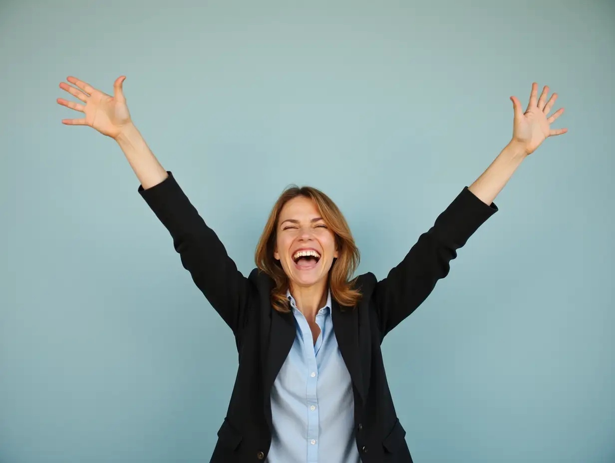 Joyful Businesswoman Celebrates Career Milestone with Raised Arms Proud and Accomplished Professional Success