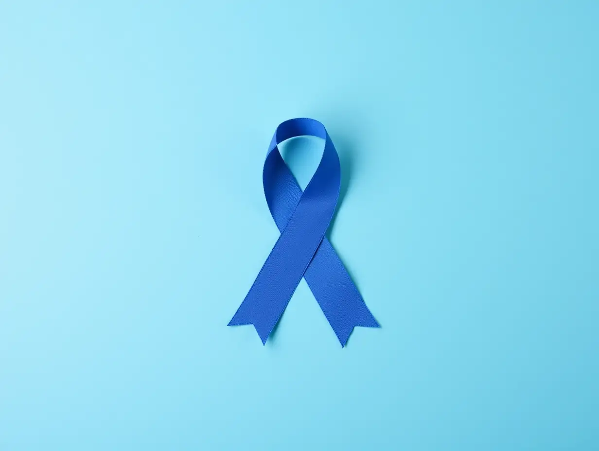 Blue-Ribbon-on-Color-Background-Prostate-Cancer-Awareness-Concept