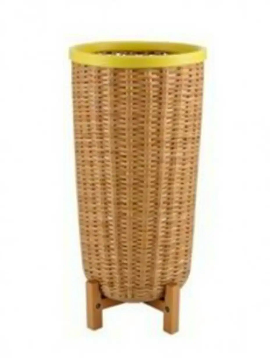 A tall, handcrafted traditional woven bamboo basket with a natural light brown color, tightly interwoven pattern, and a slightly flared shape. The top edge is reinforced with a yellow binding, adding a decorative touch. The base is supported by a sturdy wooden frame with visible fastenings, providing stability. The overall shape is elongated, giving the basket a taller appearance while maintaining its authentic woven texture and rustic charm. The background is plain white.