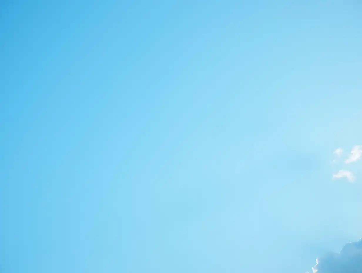 Calm-Daytime-Blue-Sky-with-Soft-White-Clouds-and-Hint-of-Sunshine