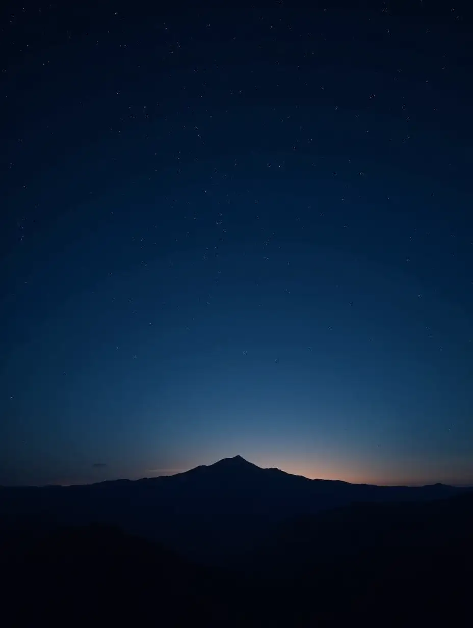 Starry-Night-Over-Mountain-Range-with-Carmin-Horizon-Glow