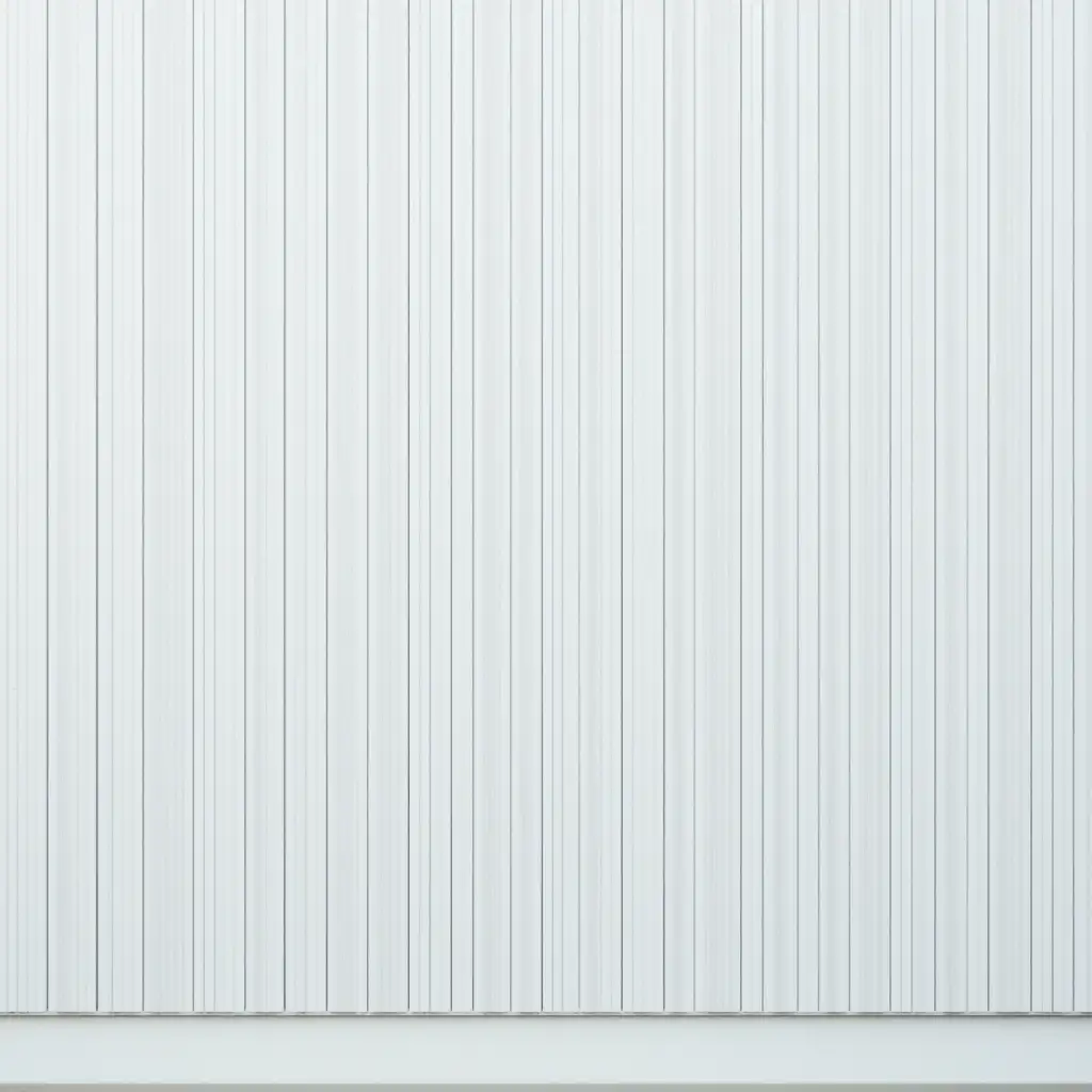 Contemporary-Architectural-Design-Featuring-a-Wall-of-Thin-White-Wooden-Strips