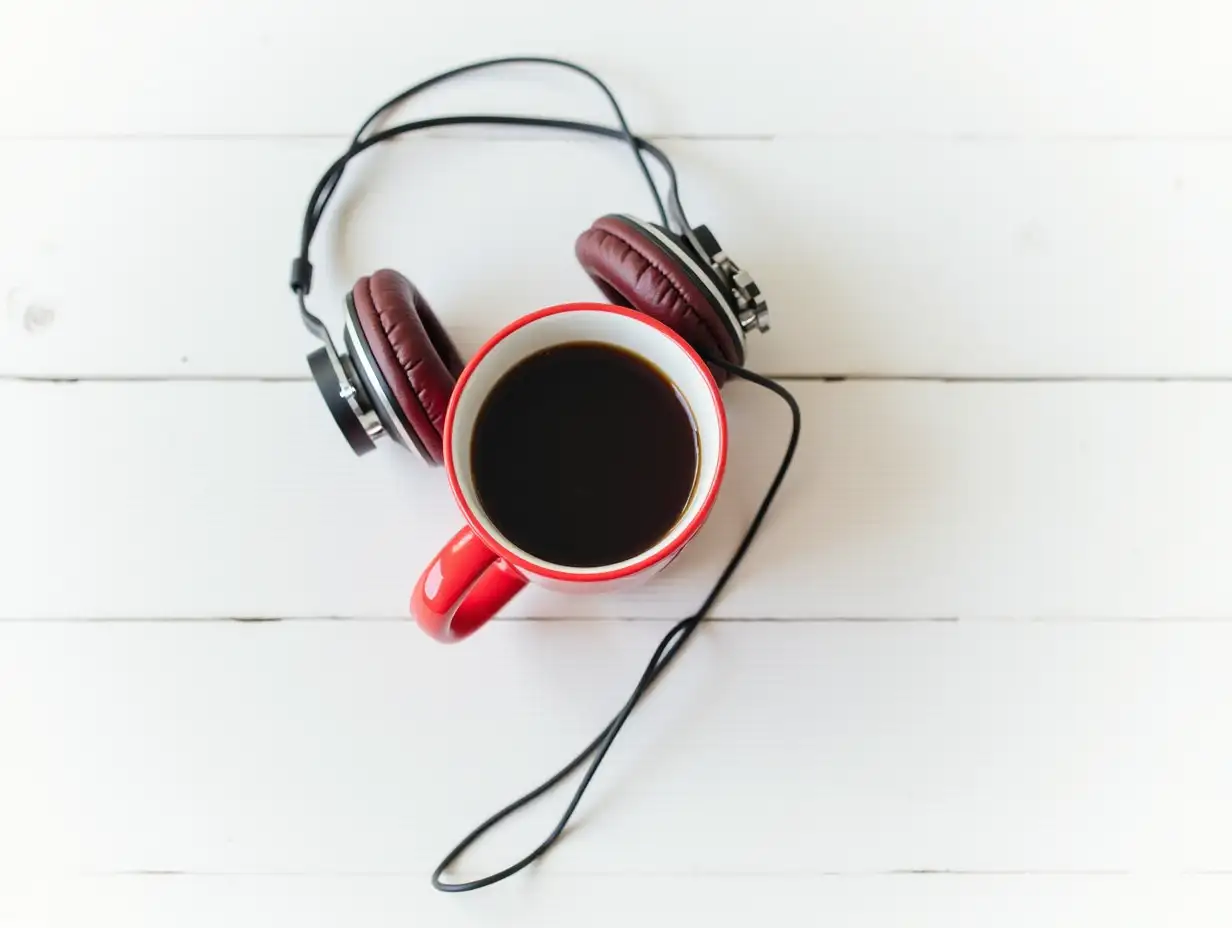 AI-Image-Prompt-ExpansionMinimalist-Flat-Lay-of-Red-Coffee-Mug-with-Black-and-Red-Headphones-on-Whitewashed-Wooden-Surface