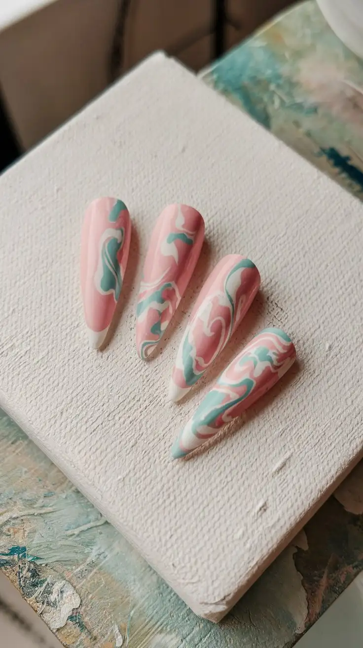 Abstract-Swirl-Stiletto-Nails-in-Pastel-Pink-Baby-Blue-and-White