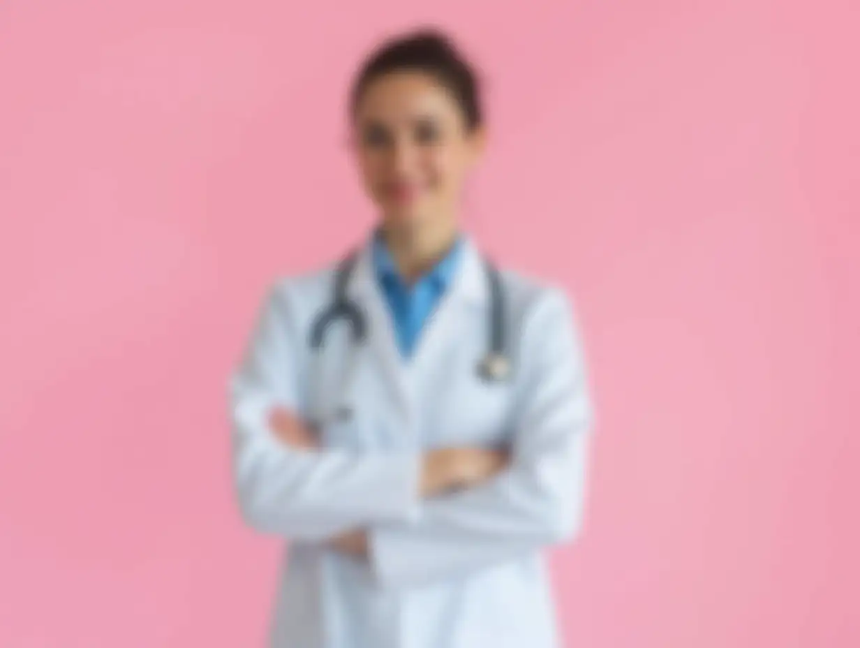 Support-for-Onco-Patients-Beautiful-Girl-Doctor-Nurse-and-Surgeon-with-Breast-Cancer-Prevention-Concept-on-Pink-Background