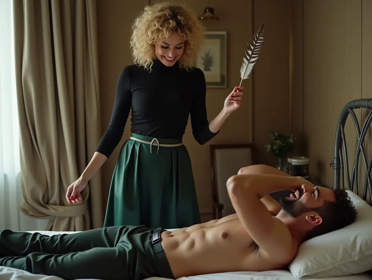 A luxury hotel room. A beautiful grinning curly haired blonde woman is standing . She has a very strong grin clenching her teeth. She is gently touching her husbands feet with a long thin stripy feather in her right hand. She has long red fingernails. She is wearing a black turtle neck tee shirt , with a silver belt, long dark green shiny satin circle maxi skirt and silver high heeled shoes. She is staring at a man on a metal bed. The man is lying back on the bed. the man is wearing an open shirt, trousers, His hands are strapped to be the bedpost. His ankles are strapped to a metal bed post. he is wearing no shoes. His feet are bare. He is holding his head in his hands. He is laughing hysterically