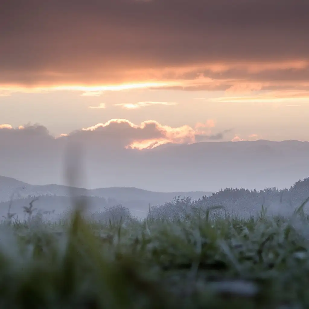 Serene-Landscape-at-Dawn-with-Misty-Mountains-and-Reflections